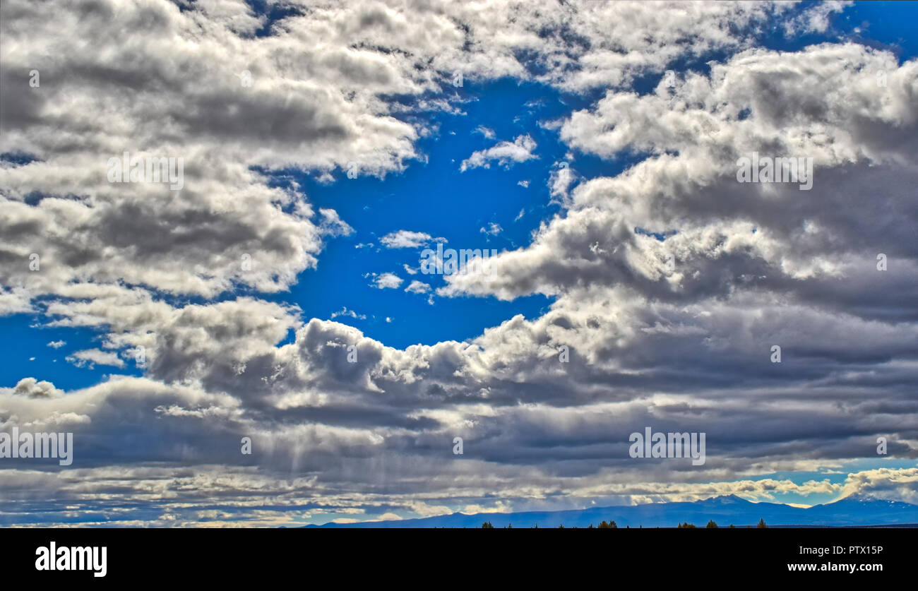 Partly cloudy skies in Central Oregon Stock Photo