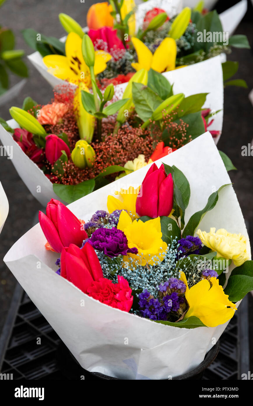 Fresh flower bouquets on display at the farmers market Stock Photo