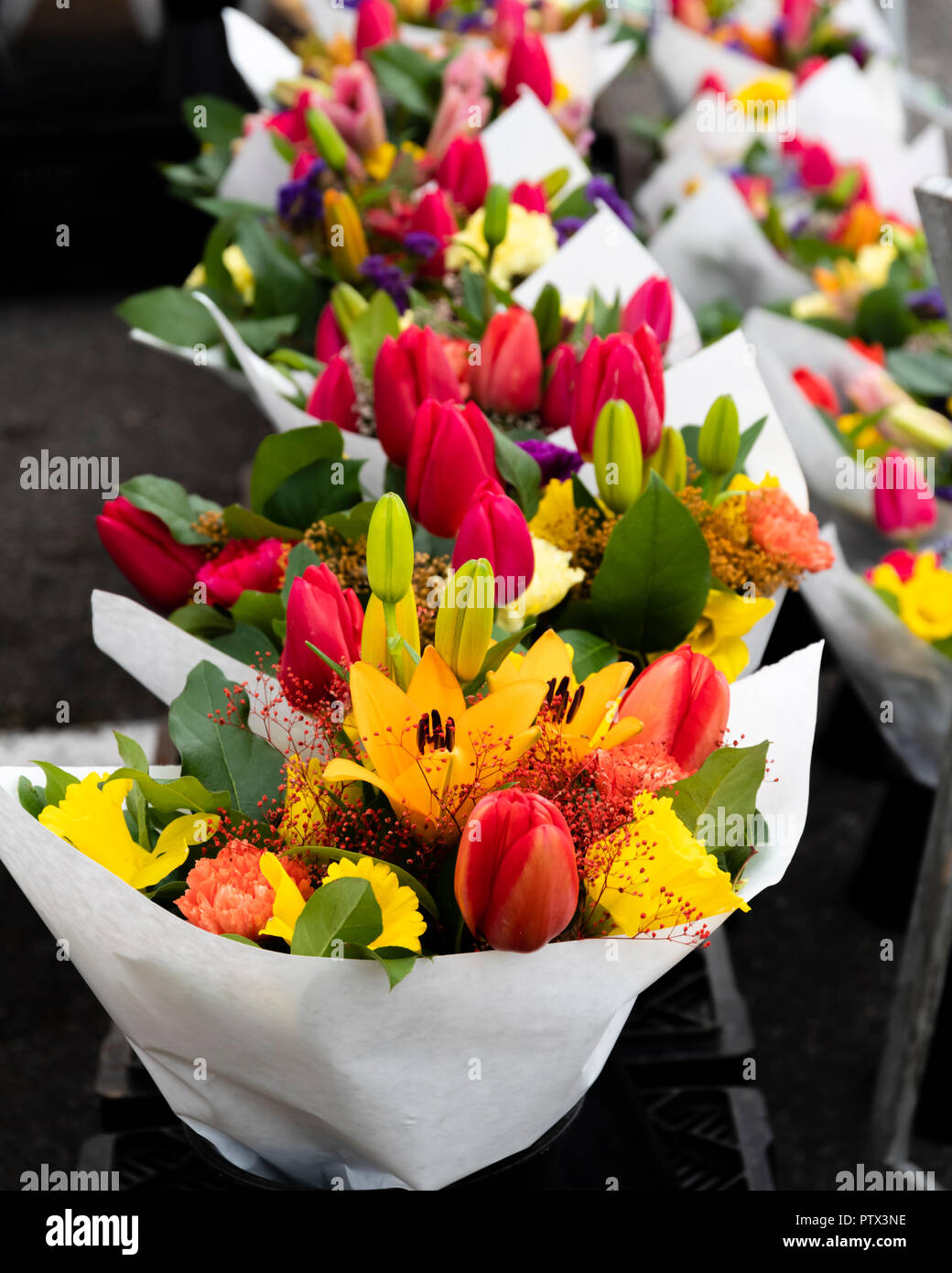 Fresh flower bouquets on display at the farmers market Stock Photo