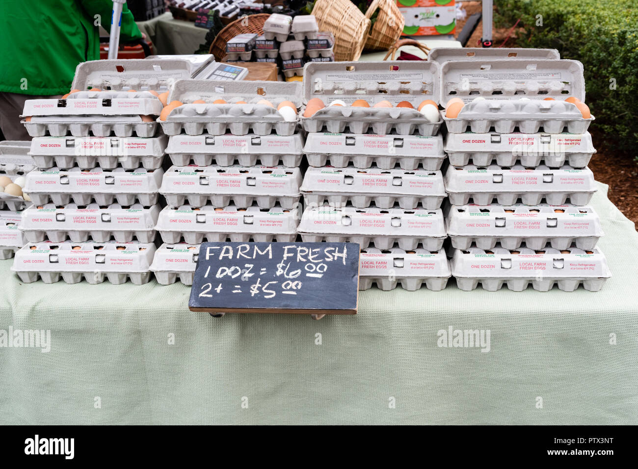 Cartons of farm fresh eggs on display at the farmers market Stock Photo