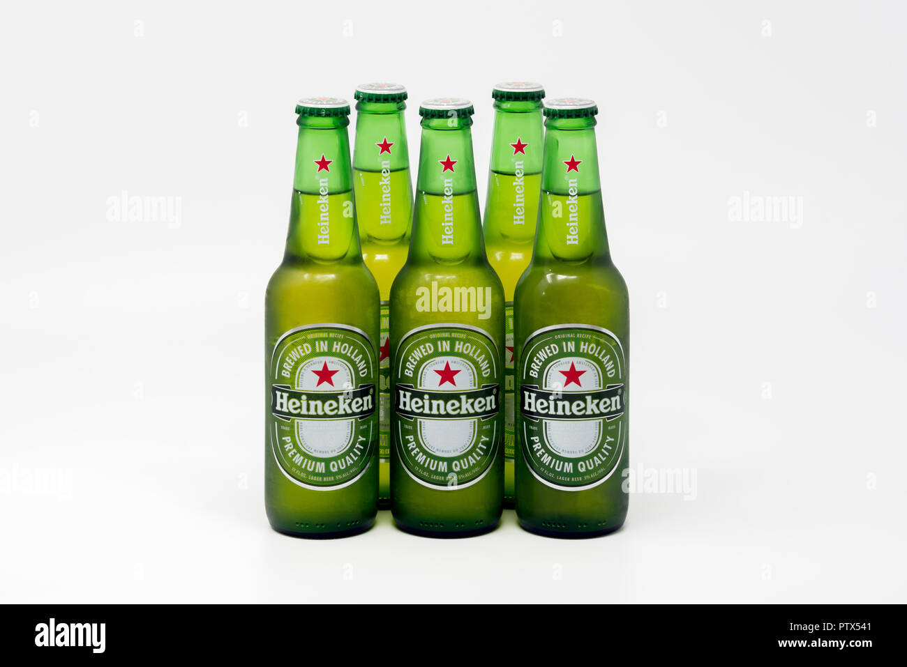Portland, OR / USA - October 10 2018: : Cold bottles of Heineken Lager Beer with slight frost, isolated on white background. Stock Photo