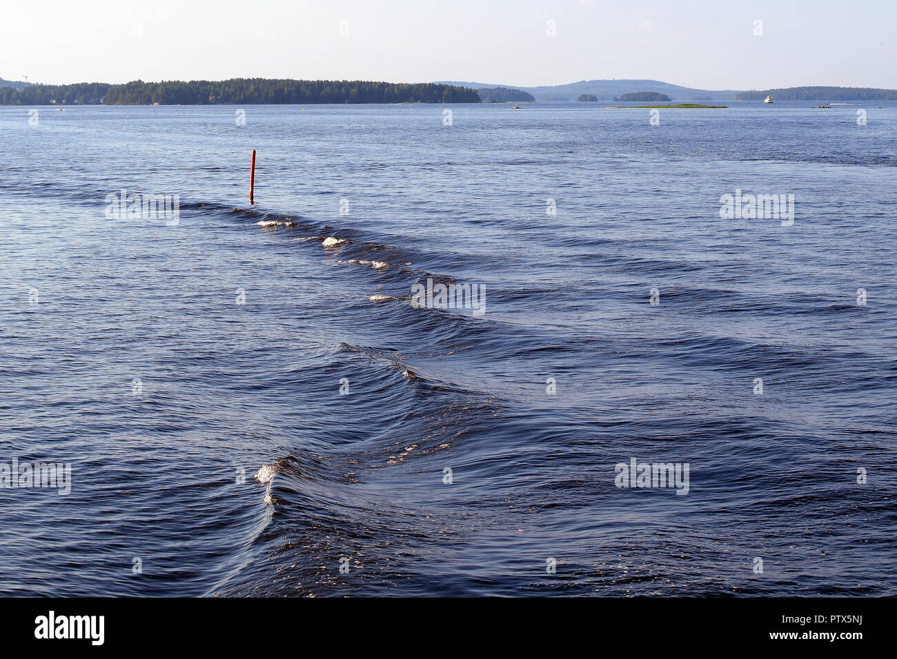 Small stren wave and beautiful lake landscape. Location: Lake Kallavesi, Kuopio, Finland. Stock Photo