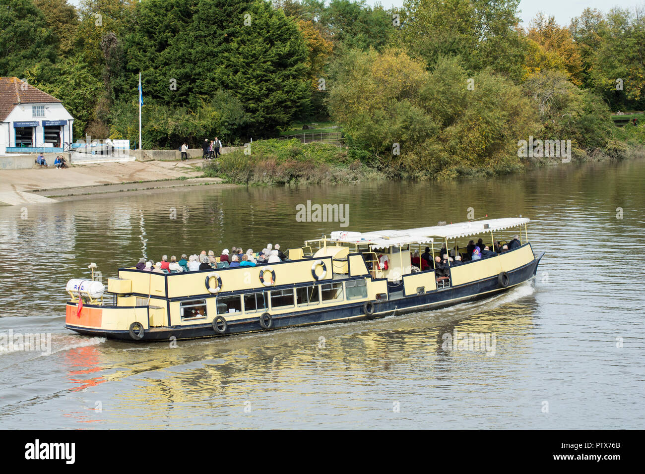 A pleasure cruiser on the River Thames, Barnes, London, SW13, UK Stock Photo