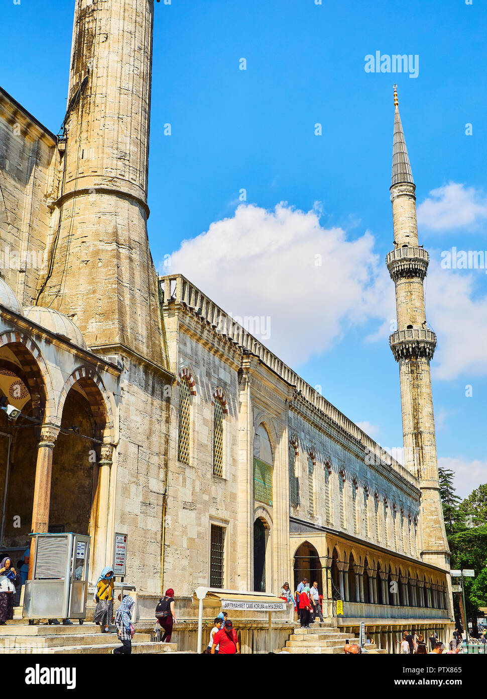Istanbul, Turkey - July 7, 2018. Tourists at the north-eastern entry to The Sultan Ahmet Camii Mosque, also known as The Blue Mosque. Istanbul, Turkey Stock Photo