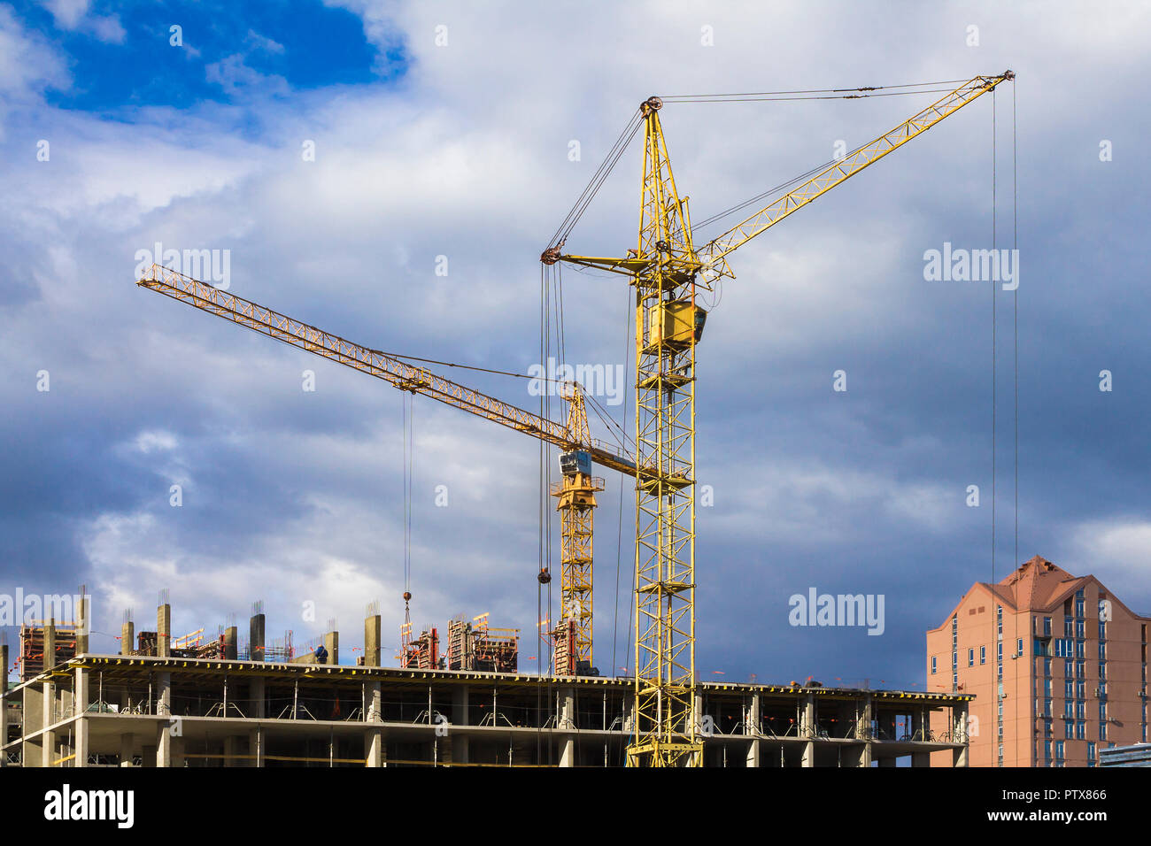 Construction crane on development site. No people. Stock Photo