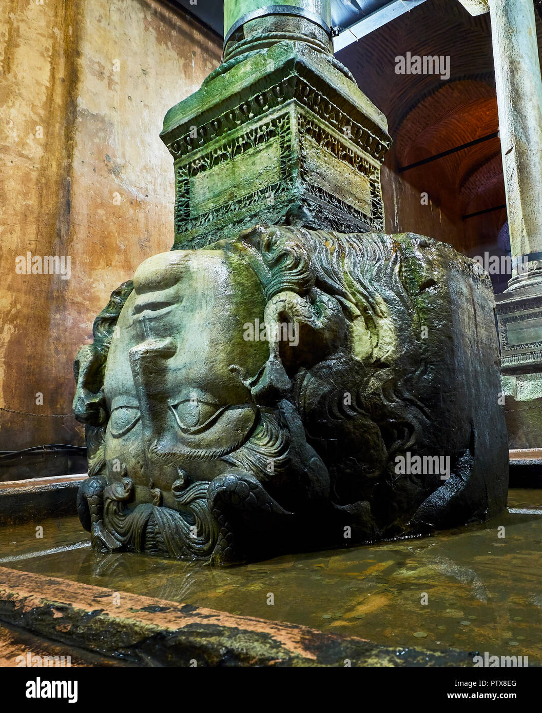 Upside-down head of Medusa in the subterranean Basilica Cistern, also known as Yerebatan Sarnici. Istanbul, Turkey. Stock Photo