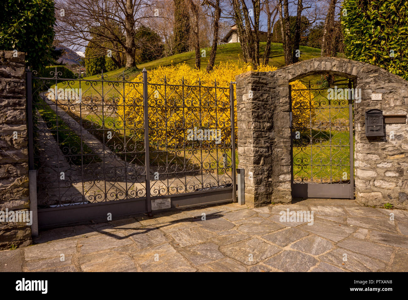 Menaggio, Italy-April 2, 2018: Gates in front of a park at Menaggio, Lombardy Stock Photo