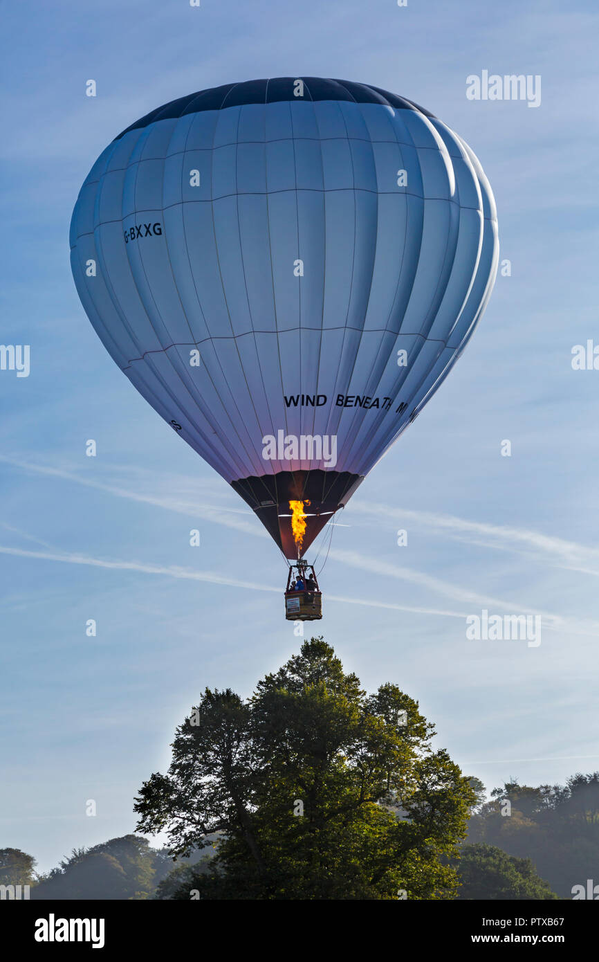 Wind beneath my wings hot air balloon in the sky with burners going