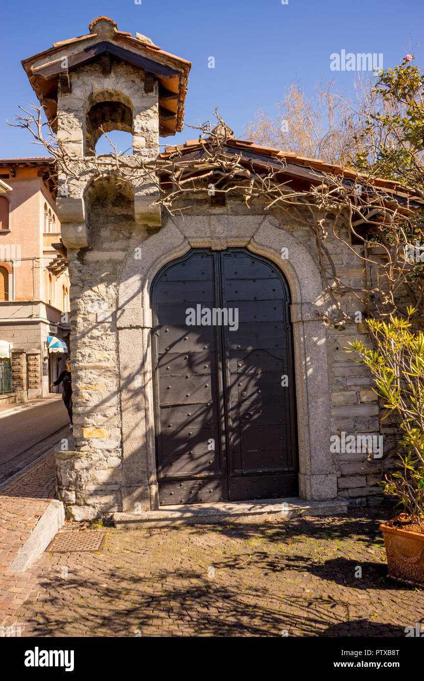 Menaggio, Italy-April 2, 2018: an old stone building with chimney, Lombardy Stock Photo