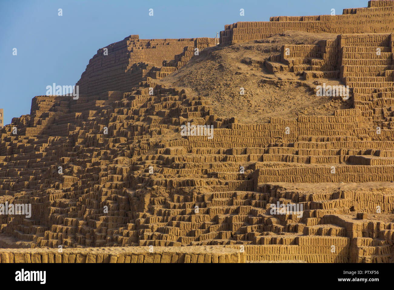 Huaca Pucllana, is a nearly 2000-year-old clay & adobe stepped pyramid from the Lima Culture, photographed in Miraflores, Lima, Peru in the summer. Stock Photo