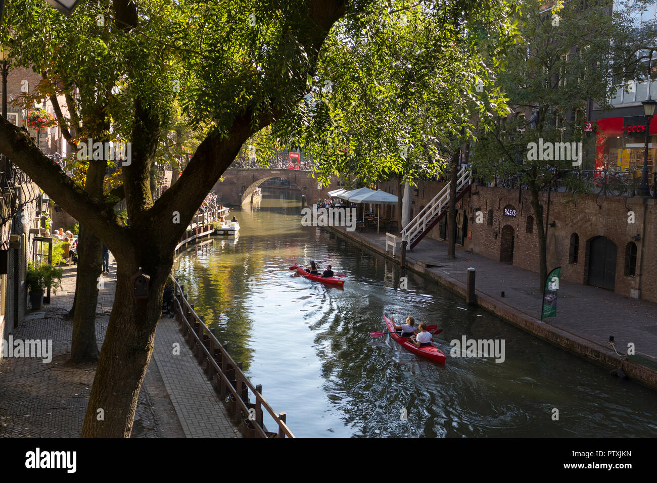 Utrecht, Netherlands - September 27, 2018: Canoeing on the canal in the historical center of Utrecht in autumn Stock Photo