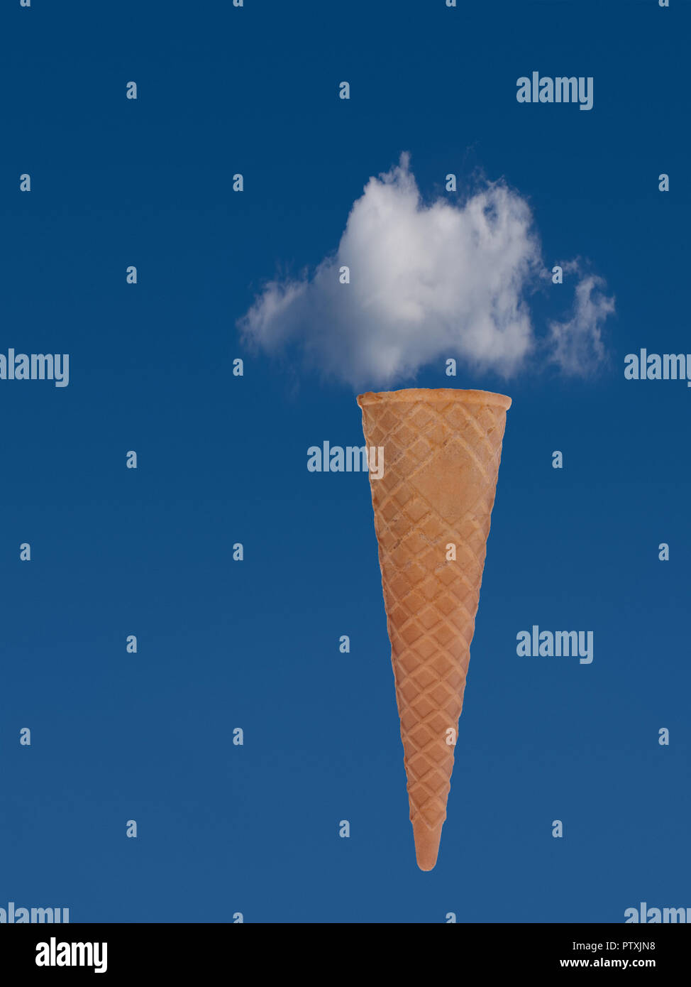 Ice cream cone with blue sky and cloud. Dream holiday, vacation concept. Stock Photo