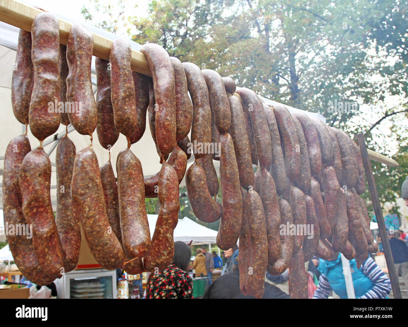 Sausages. Sausages hang outdoor for sale on a street market.Home made