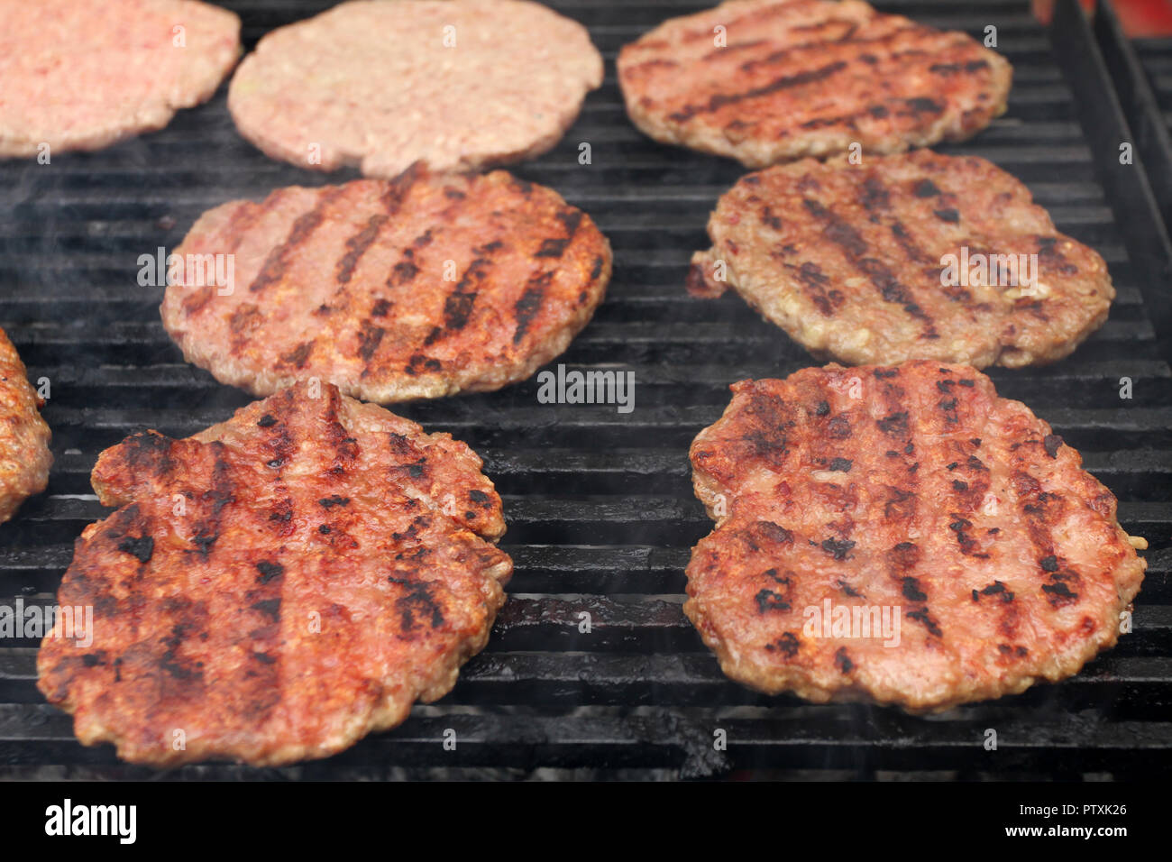 Burger Grilling on Fire. Homemade Hamburgers. Grill Meatballs. Making Hamburgers on a Grill