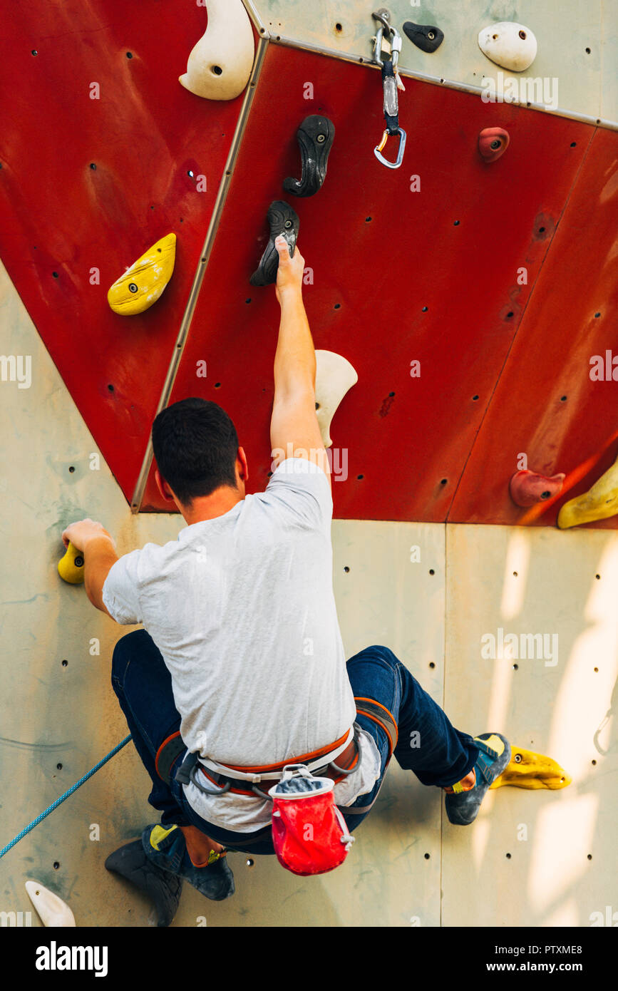 Free climber man climbing up on bouldering Stock Photo Alamy