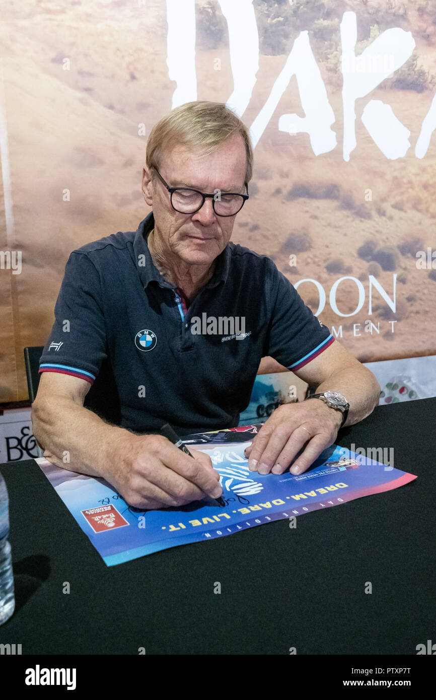 Alges, PORTUGAL: Ari Vatanen testing the portuguese game Dakar18 with Paulo Gomes CEO and Director of Bigmoon Entertainment on 4th and last day of Comic Con Portugal 2018 in Passeio Maritimo de Alges in Alges, Sunday, Sep. 9, 2018. Due to be released on Sep. 11 on PlayStation 4, Xbox One, Microsoft Windows  Featuring: Ari Vatanen Where: Algés, Oeiras, Portugal When: 09 Sep 2018 Credit: Rui M Leal/WENN.com Stock Photo