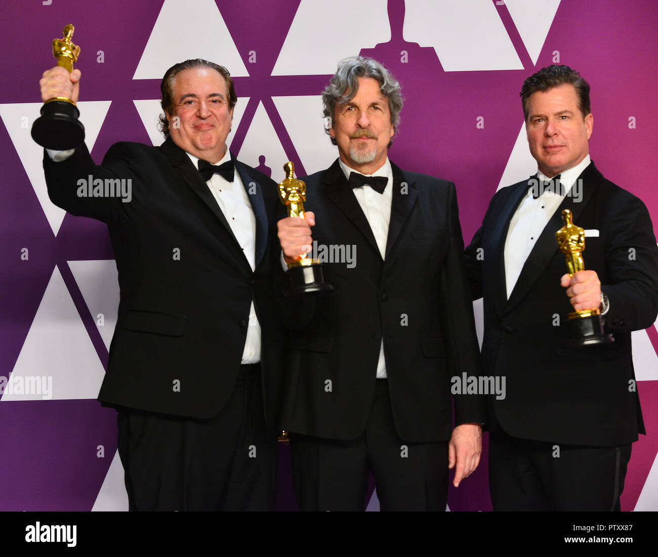 Los Angeles, USA. 24th Feb, 2019. im Burke, Charles B. Wessler, Nick Vallelonga, Peter Farrelly and Brian Currie pose with the Best Picture and Best Original Screenplay award for Green Book' 041 at the 91st Annual Academy Awards in the press room during at Hollywood and Highland on February 24, 2019 in Hollywood, California Credit: Tsuni/USA/Alamy Live News Stock Photo