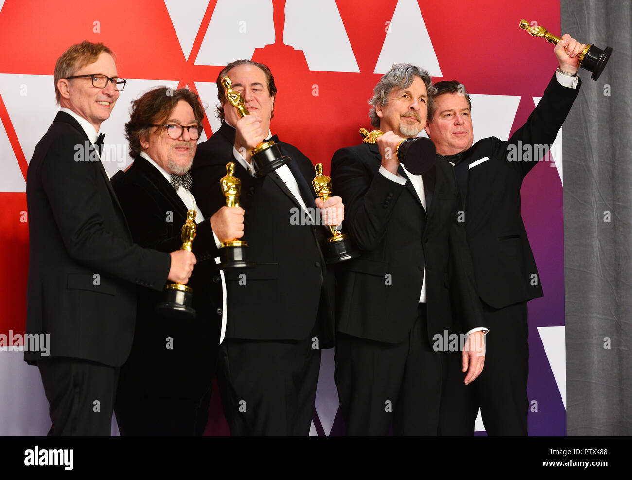 Los Angeles, USA. 24th Feb, 2019. im Burke, Charles B. Wessler, Nick Vallelonga, Peter Farrelly and Brian Currie pose with the Best Picture and Best Original Screenplay award for Green Book' 040 at the 91st Annual Academy Awards in the press room during at Hollywood and Highland on February 24, 2019 in Hollywood, California Credit: Tsuni/USA/Alamy Live News Stock Photo