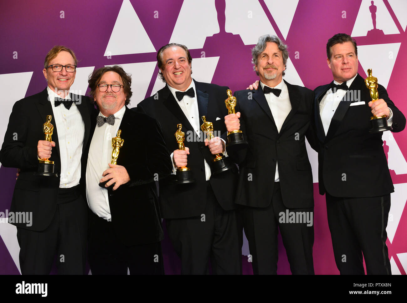 Los Angeles, USA. 24th Feb, 2019. Jm Burke, Charles B. Wessler, Nick Vallelonga, Peter Farrelly and Brian Currie pose with the Best Picture and Best Original Screenplay award for Green Book' 040 at the 91st Annual Academy Awards in the press room during at Hollywood and Highland on February 24, 2019 in Hollywood, California Credit: Tsuni/USA/Alamy Live News Stock Photo