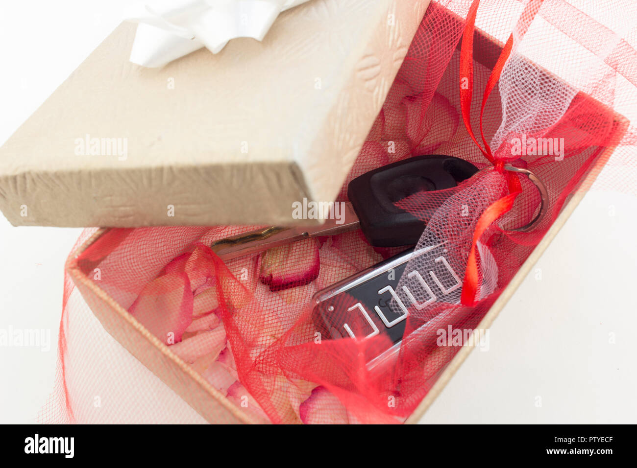 Car keys in a gift box, gift Stock Photo - Alamy