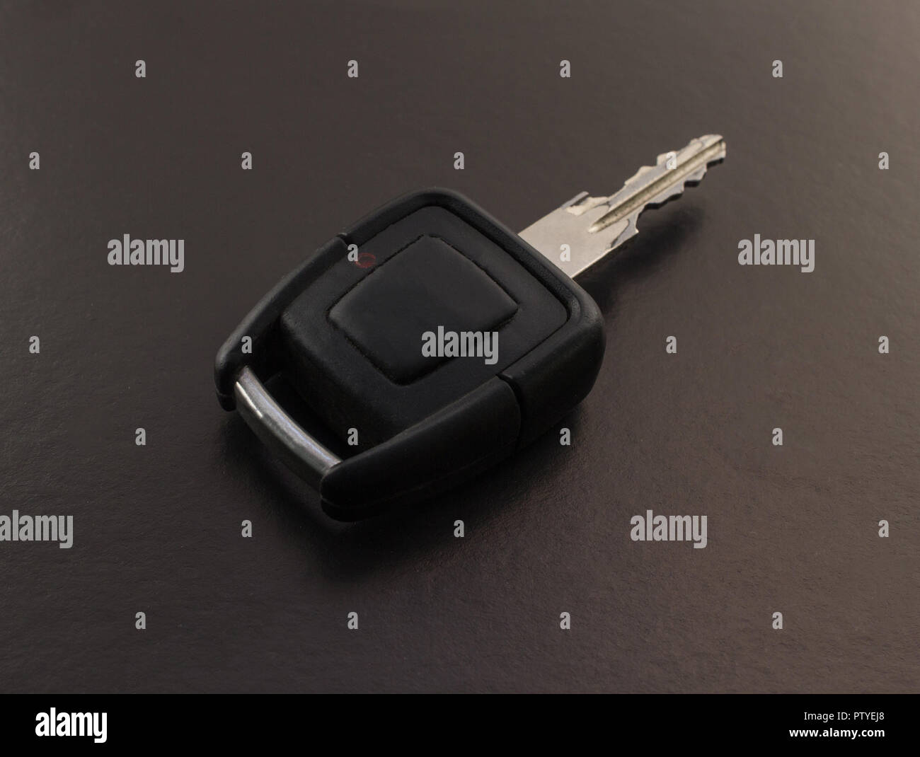 Car key on black background, close-up Stock Photo