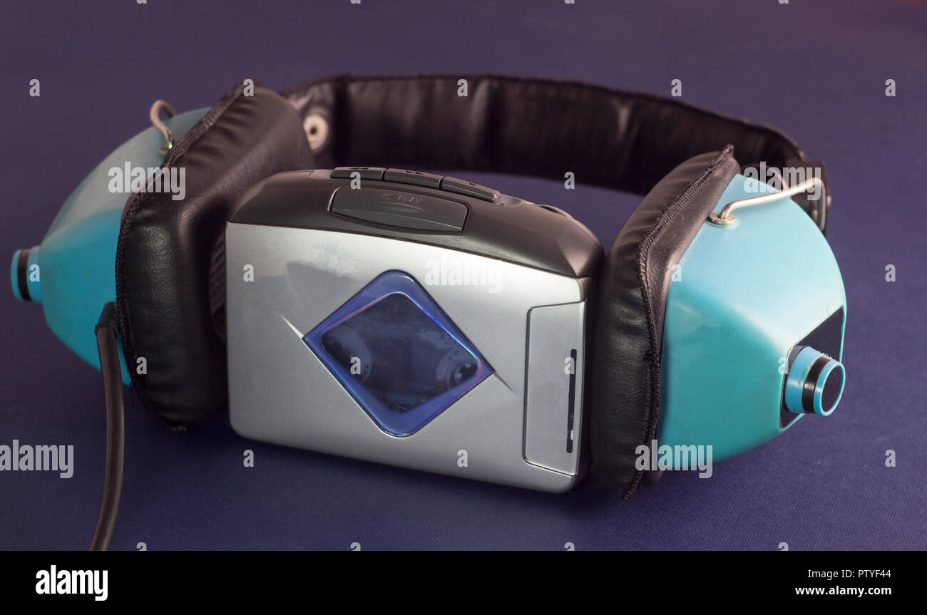 Old headphones and cassette audio player Stock Photo Alamy