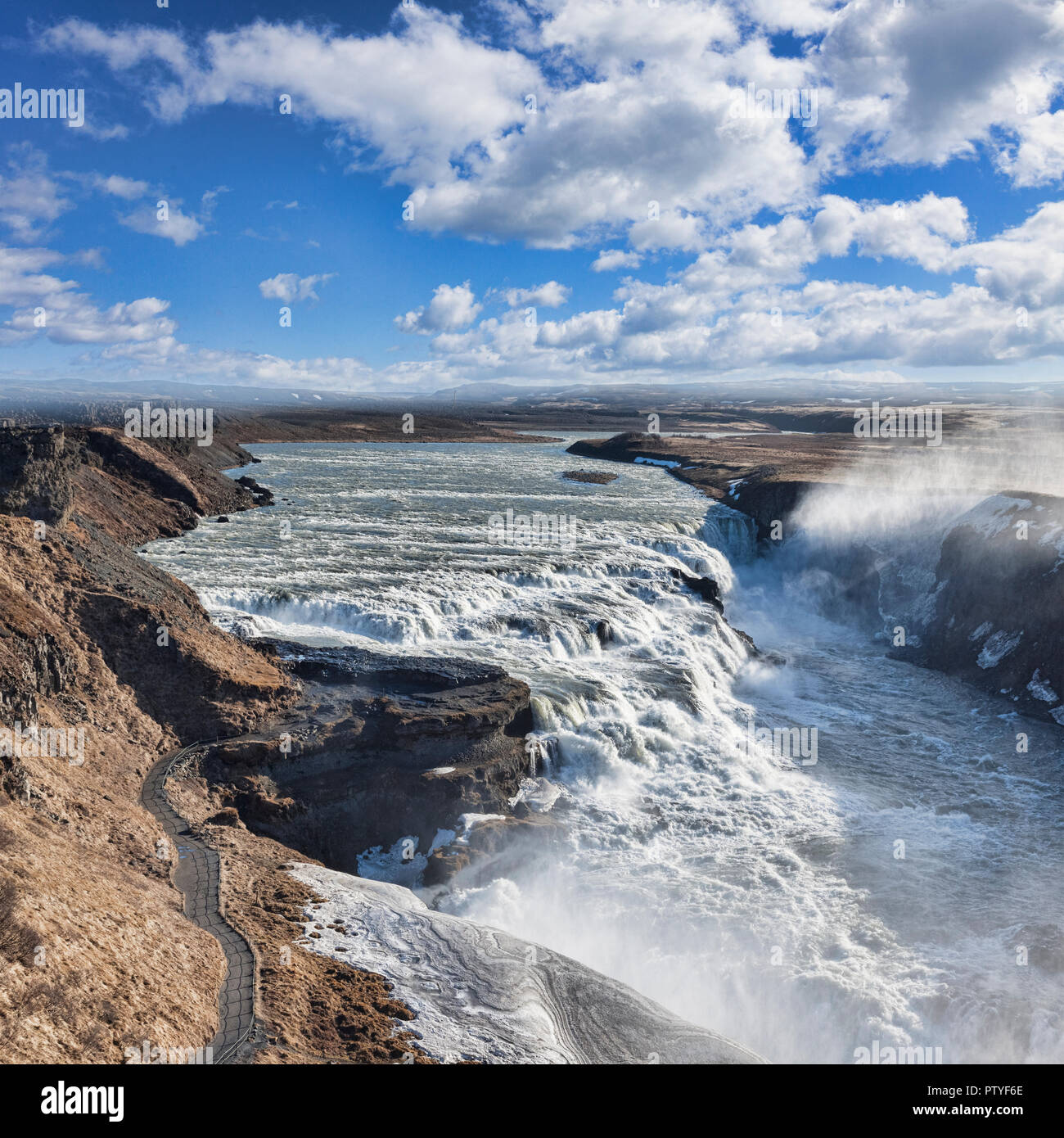 Iceland's most famous waterfall, Gullfoss, in spring, from a high viewpoint. Stock Photo