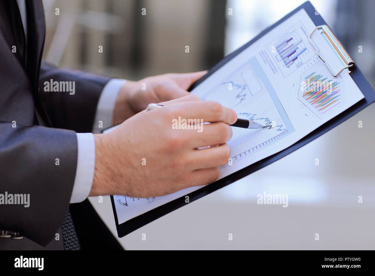 Close up businessman analyzes hi-res stock photography and images - Alamy