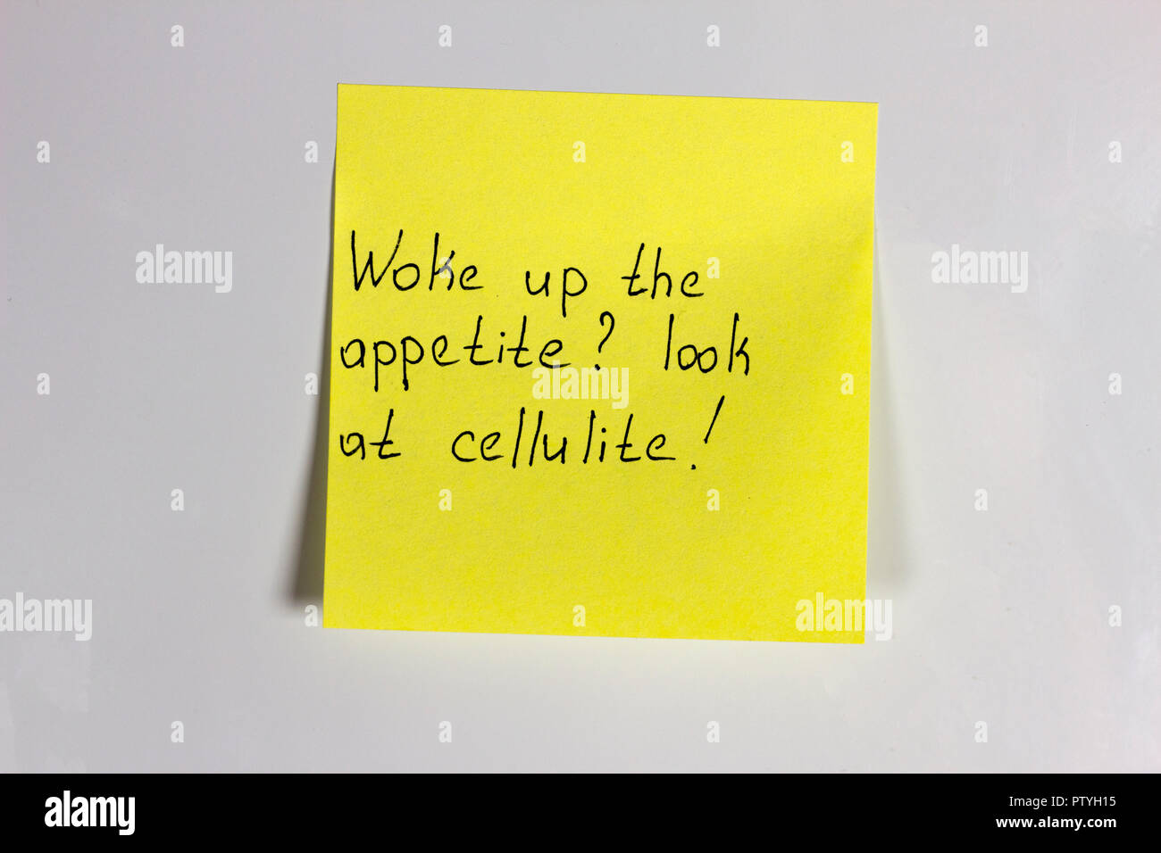 Yellow sticker on white background cilulite Stock Photo