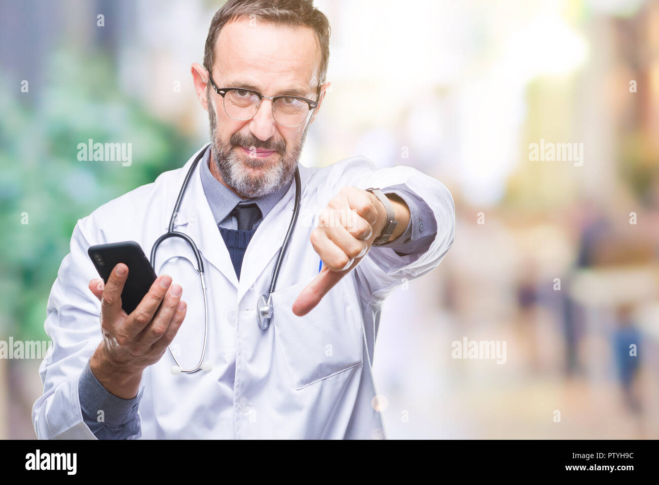 Middle Age Senior Hoary Doctor Man Texting Using Smartphone Over