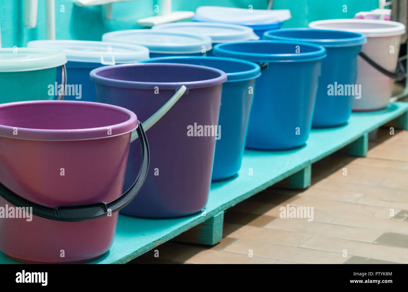 Room with cleaning tools, buckets, mops Stock Photo Alamy