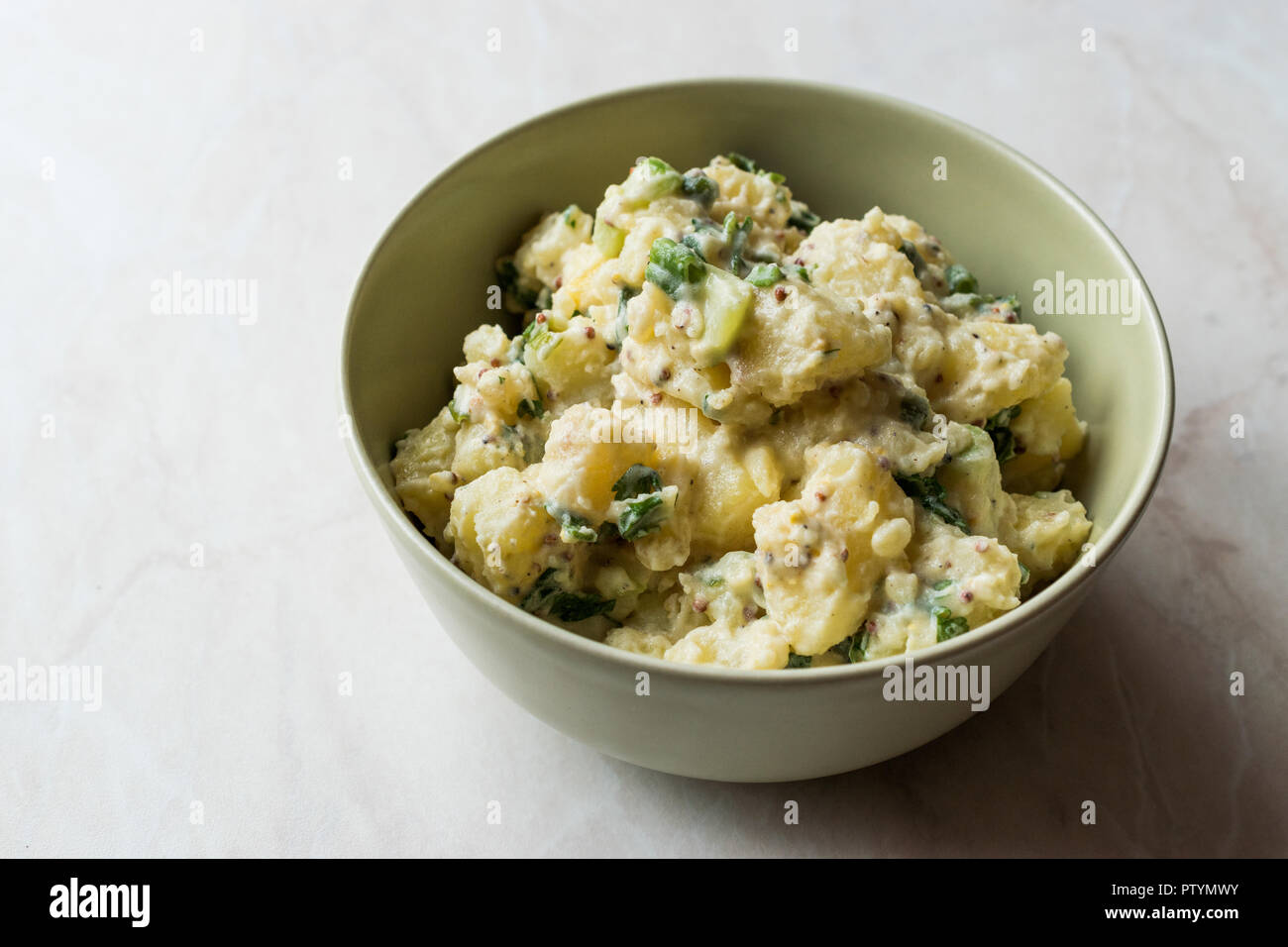 Traditional German Style Potato Salad with Mayonnaise and Mustard Seeds / Kartoffelsalat