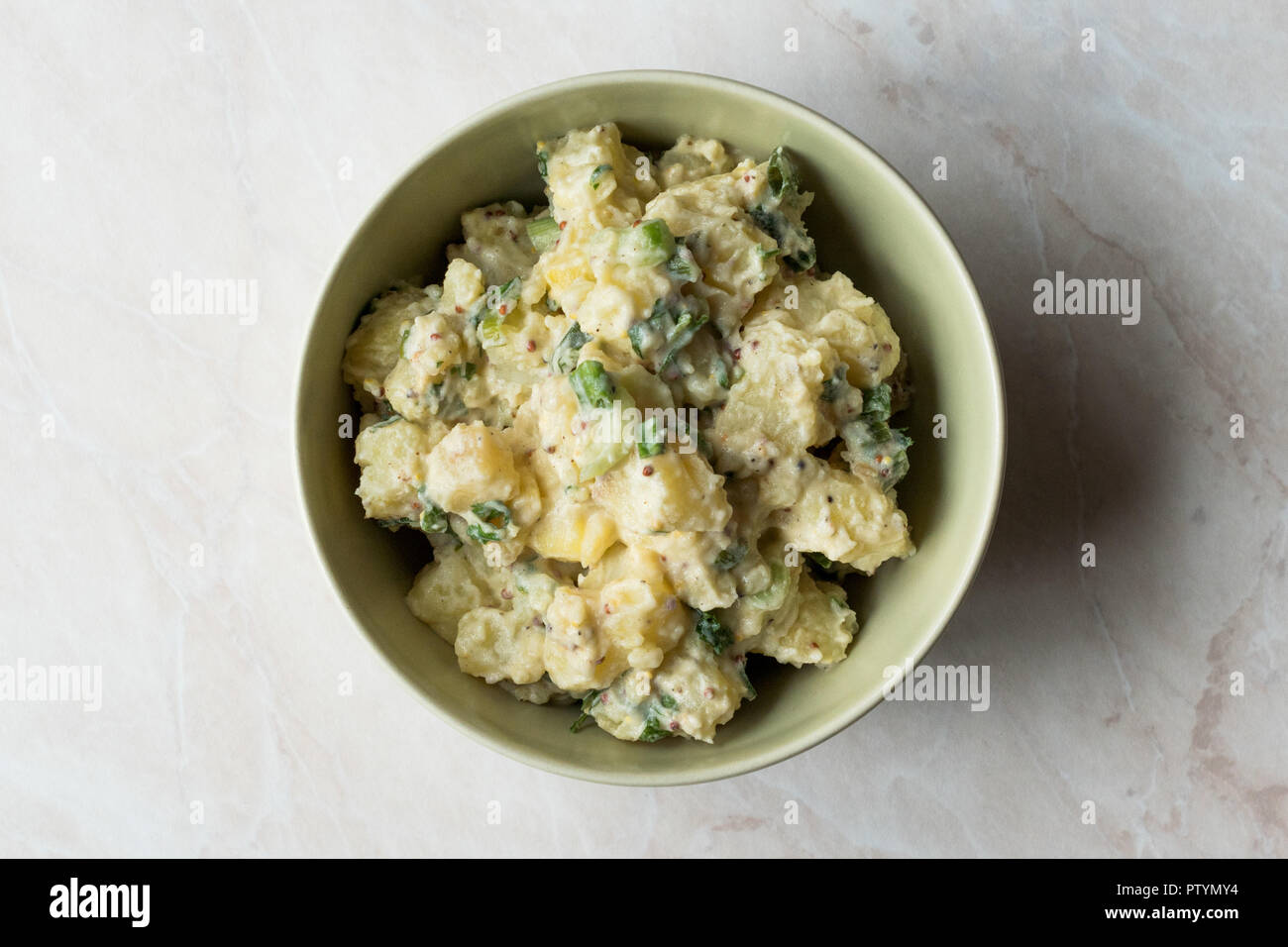 Traditional German Style Potato Salad with Mayonnaise and Mustard Seeds / Kartoffelsalat