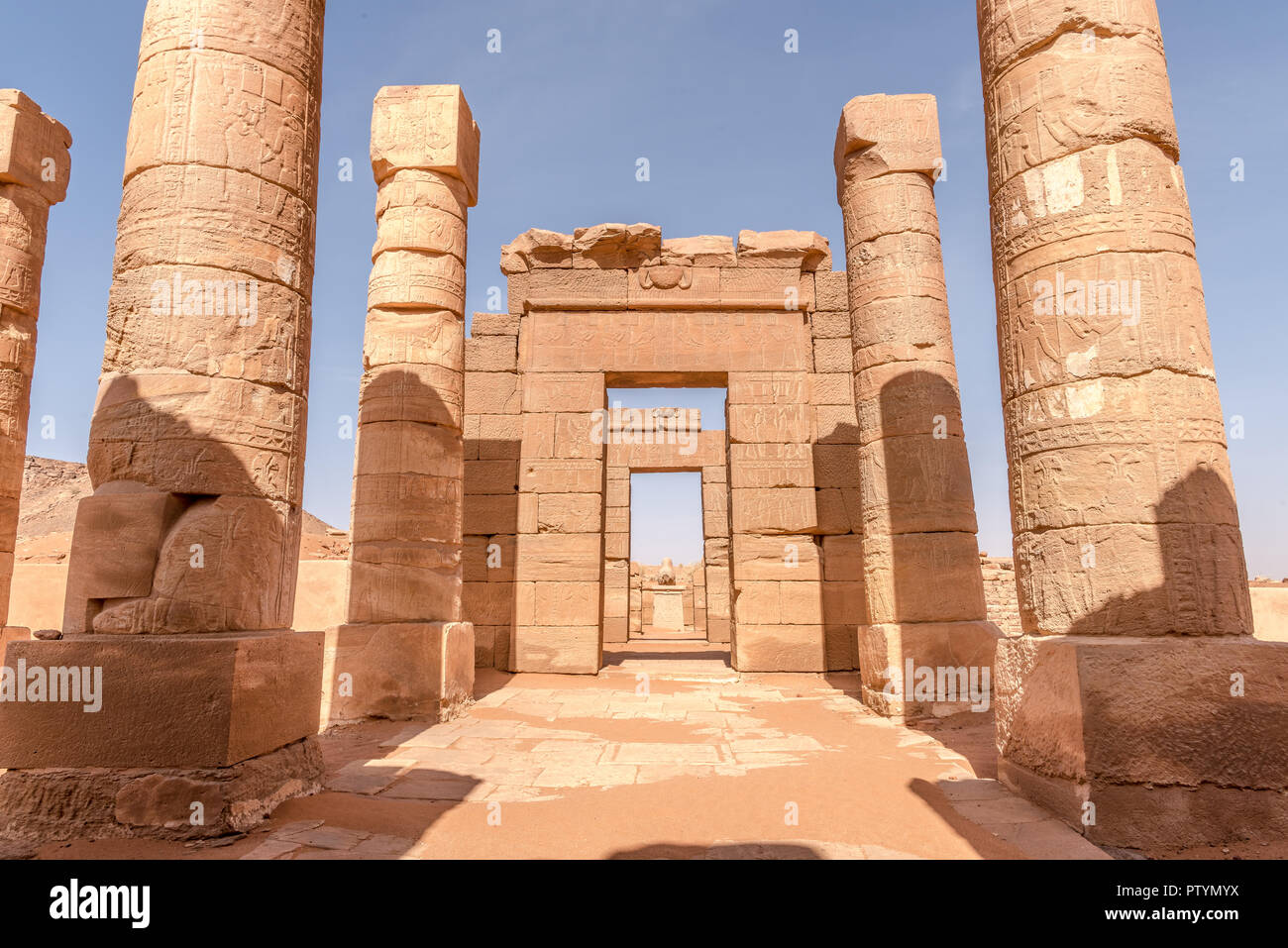 Naga temples Sudan. South of the ancient city of Meroe, stone rams guard the entrance to the Amun Temple in Naga, near a large bend in the Nile River Stock Photo