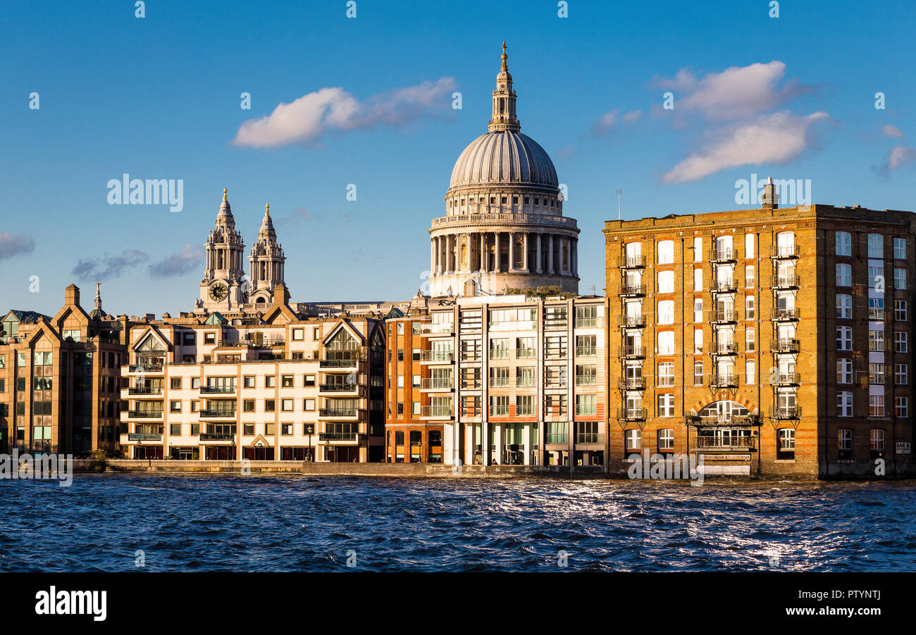 St. Paul's Cathdral on beautiful summer afternoon with Thames River in foreground, London Stock Photo