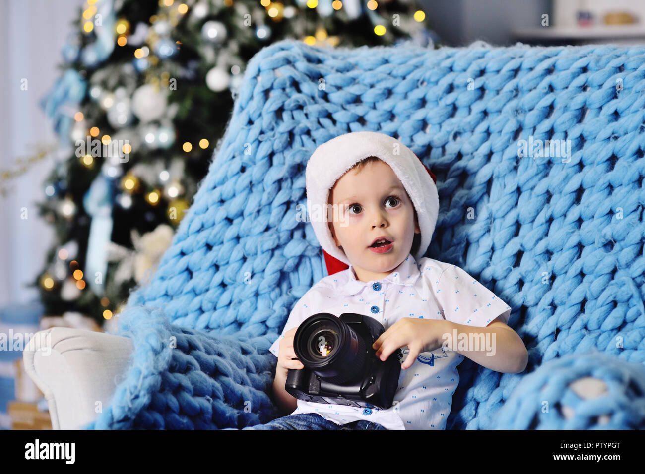 Little Baby Boy With A Slr Camera On The Background Of A Christmas Decor Stock Photo Alamy Little Baby Boy With A Slr Camera On The Background Of A Christmas Decor Stock Photo Alamy