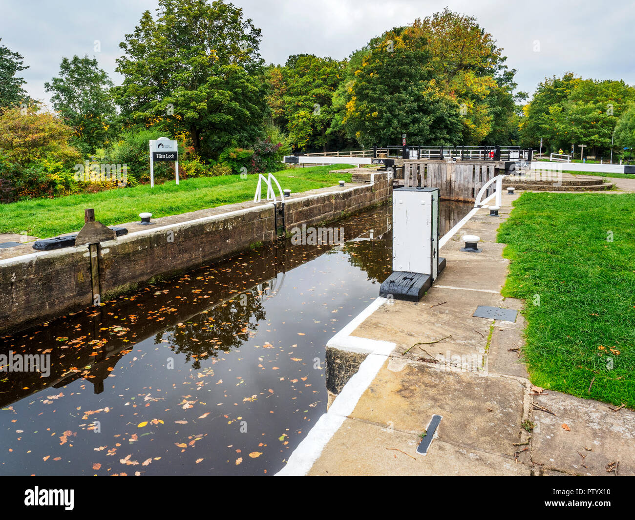 Hirst Lock on the Leeds and Liverpool Canal in early autumn near Saltaire West Yorkshire England Stock Photo