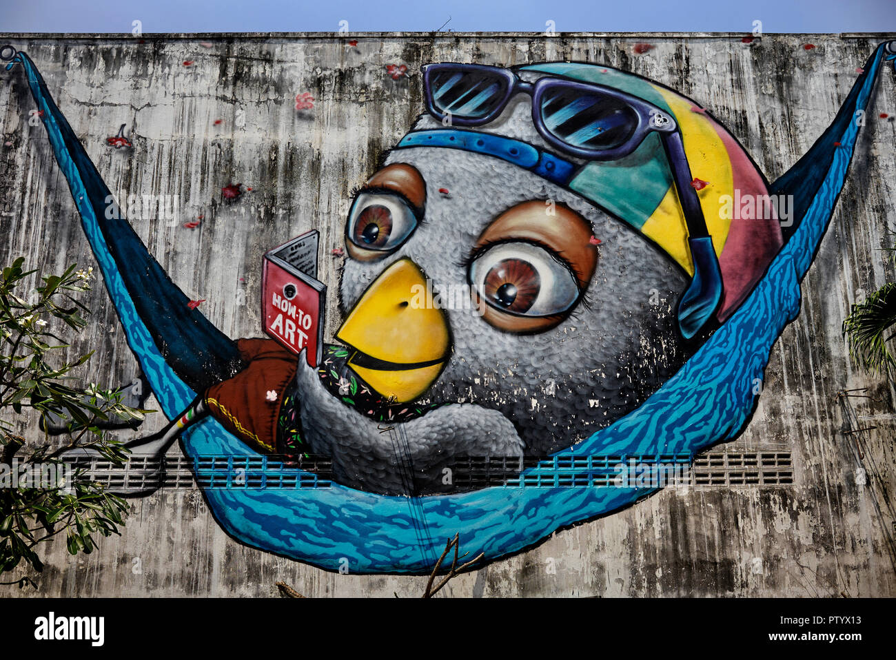 Graffiti bird wall art Stock Photo