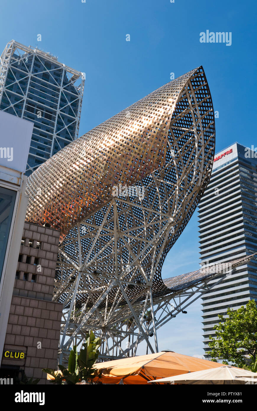 The golden fish sculpture designed by architect Frank O. Gehry, Port Olimpic, Barcelona, Spain Stock Photo