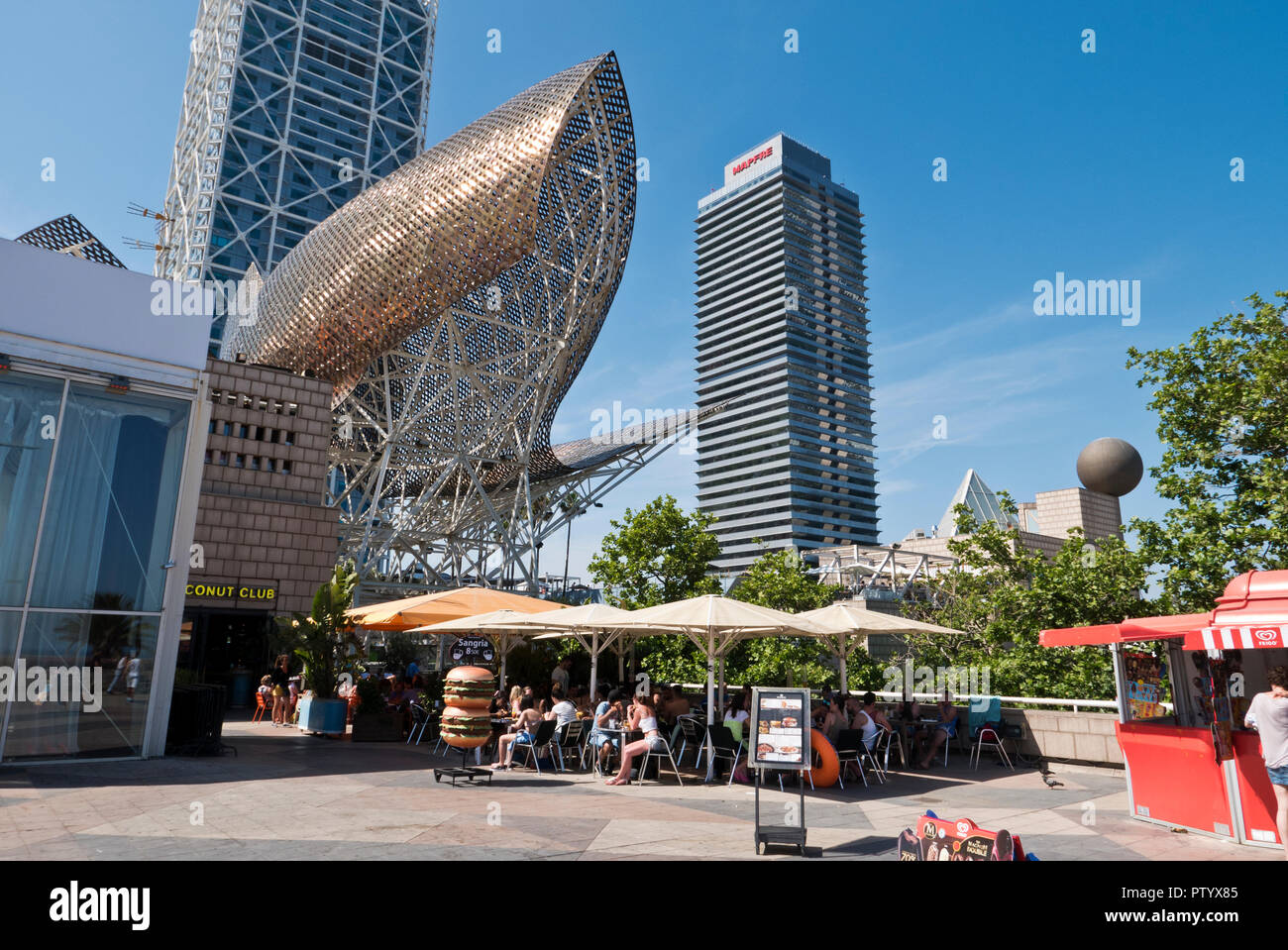 The golden fish sculpture designed by architect Frank O. Gehry, Port Olimpic, Barcelona, Spain Stock Photo