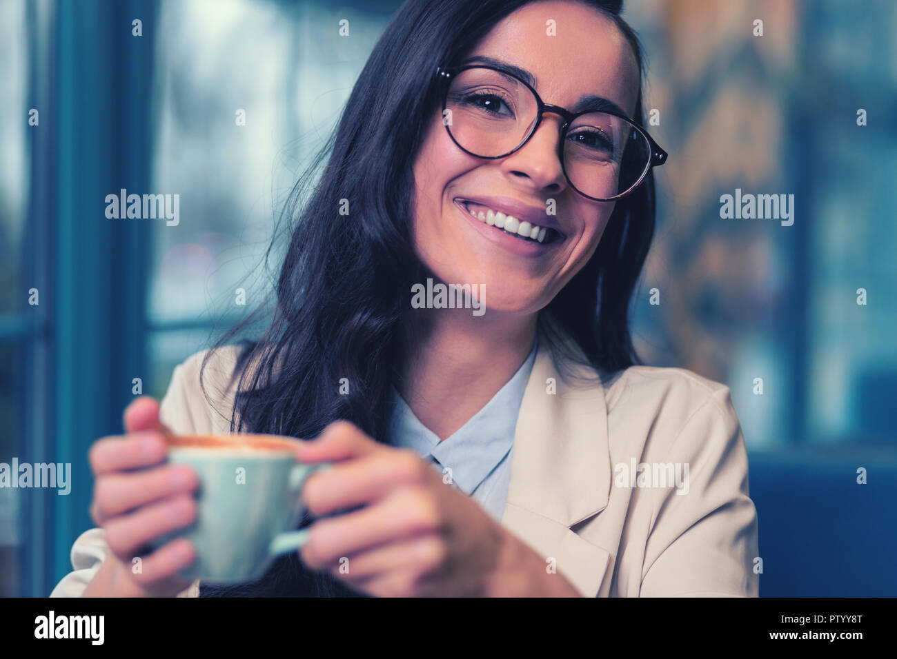 Portrait of charming girl that posing on camera Stock Photo