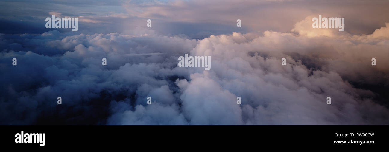 Pink sky fluffy clouds hi-res stock photography and images - Alamy