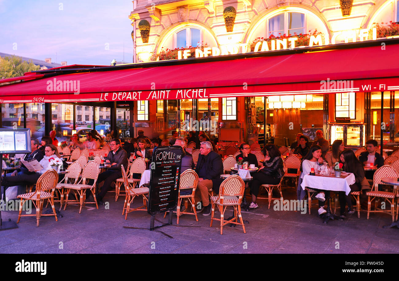 The traditional French cafe Le Depart Saint Michel with unidentified ...