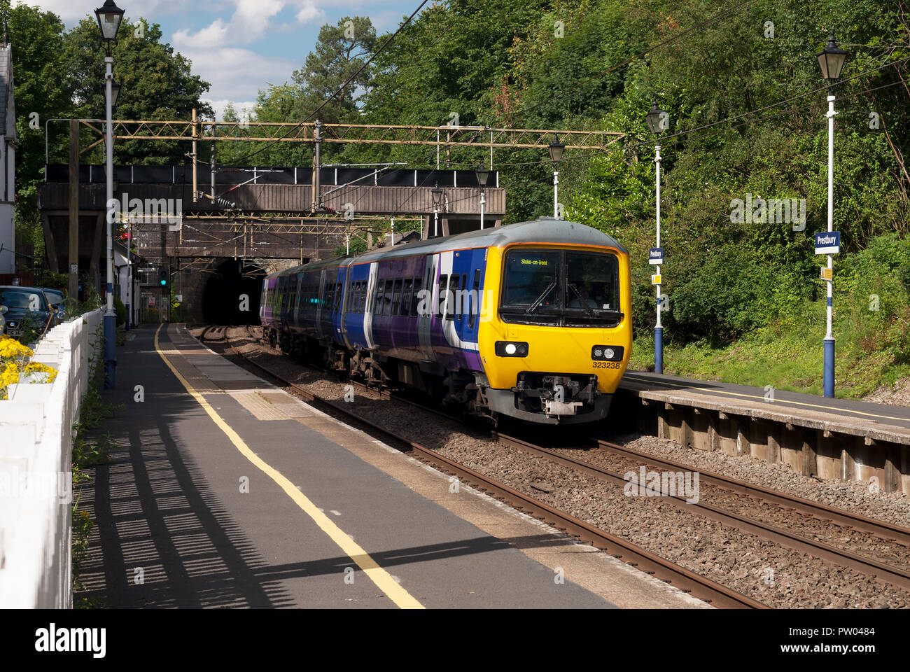 Hunslet Class 323 unit on a Manchester to Stoke-on-Trent service at Prestbury station, Cheshire. Stock Photo