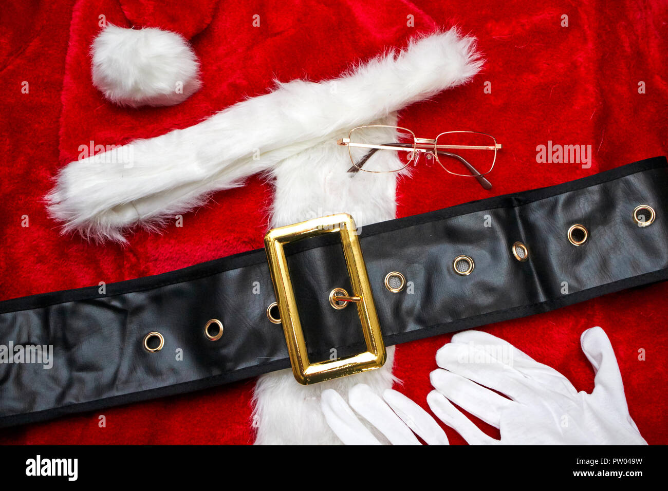 Santa costume laid out for use in Christmas grotto for pre xmas preparations Stock Photo