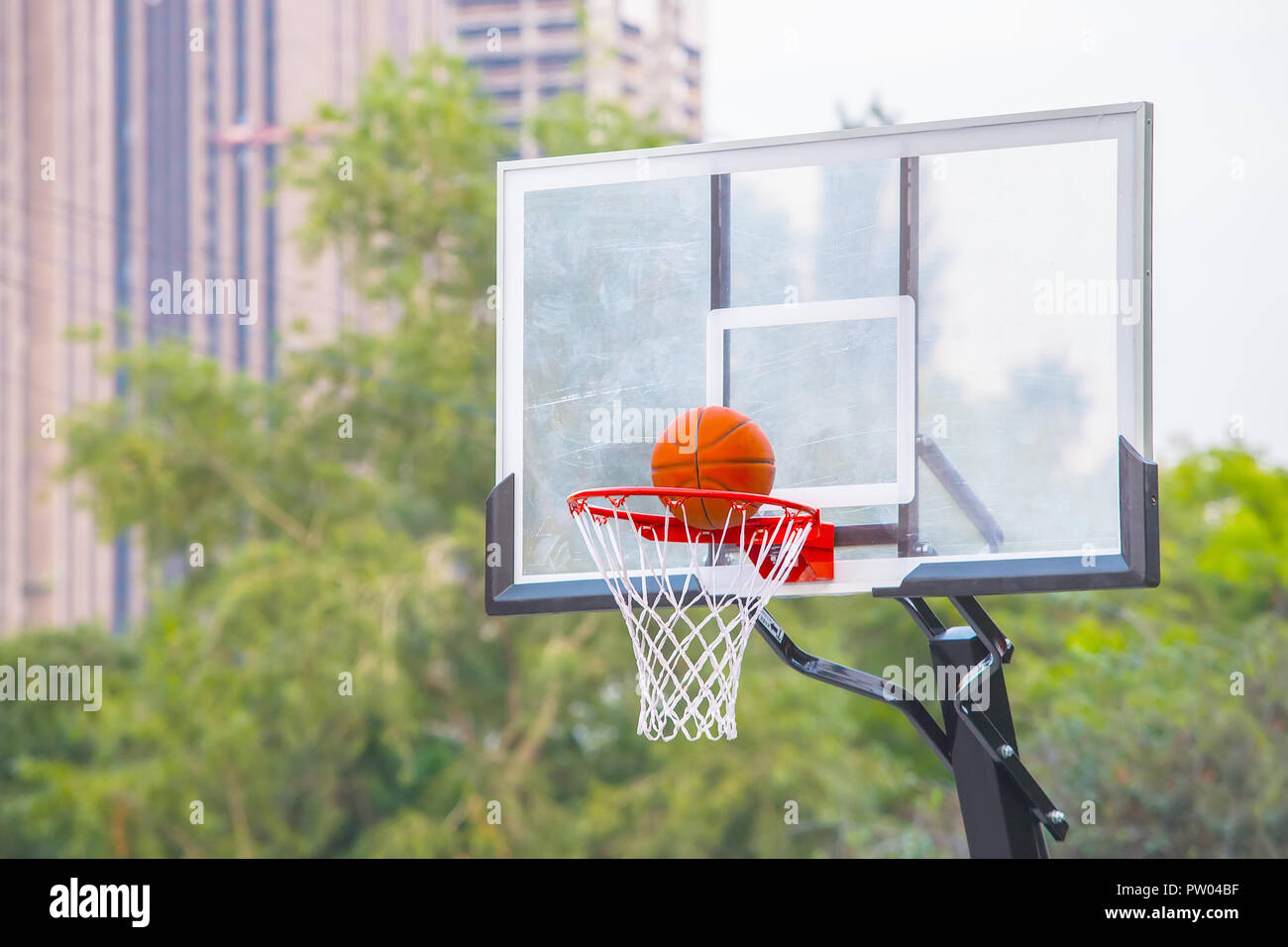 exact hit of a basketball ball into the basket Stock Photo - Alamy