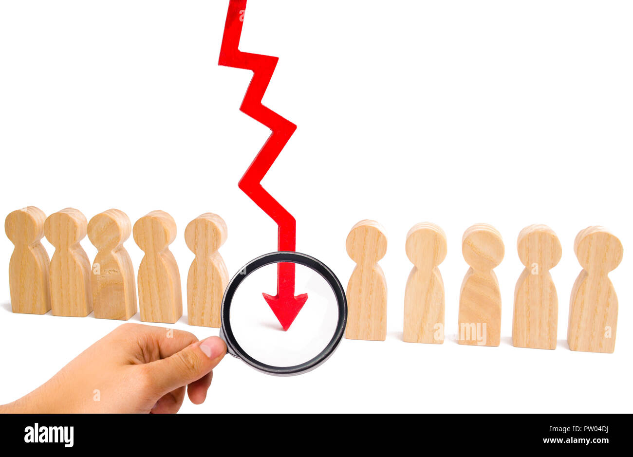 Magnifying glass is looking at a number of people and a red arrow separating them. The concept is the division of the collective, the division of the  Stock Photo
