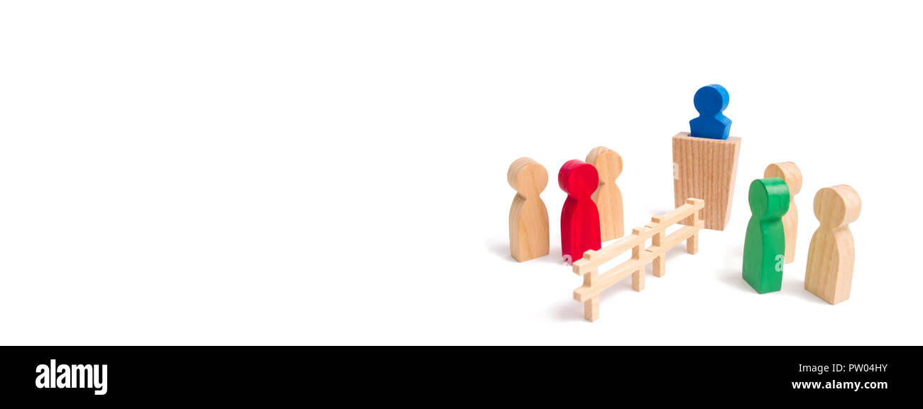 A wooden fence divides the two groups discussing the case. Termination and breakdown of relations, breaking ties. Contract break, conflict of interest Stock Photo