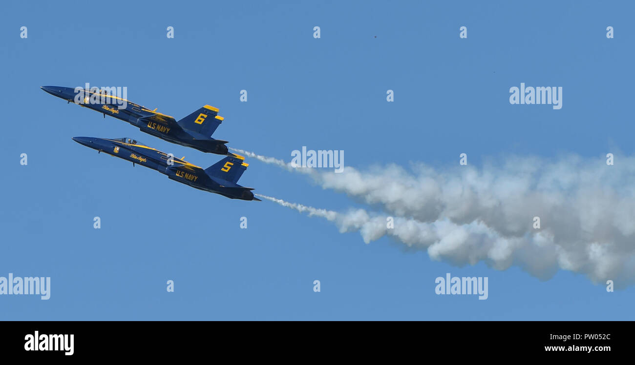 181007-N-ZC358-0389 SAN FRANCISCO (October 7, 2018) The U.S. Navy flight demonstration squadron, the Blue Angels, solo pilots perform the Section High Alpha pass at the 2018 San Francisco Fleet Week Air Show. The Blue Angels are scheduled to perform more than 60 demonstrations at more than 30 locations across the U.S. and Canada in 2018. (U.S. Navy photo by Mass Communication Specialist 2nd Class Jess Gray/Released) Stock Photo