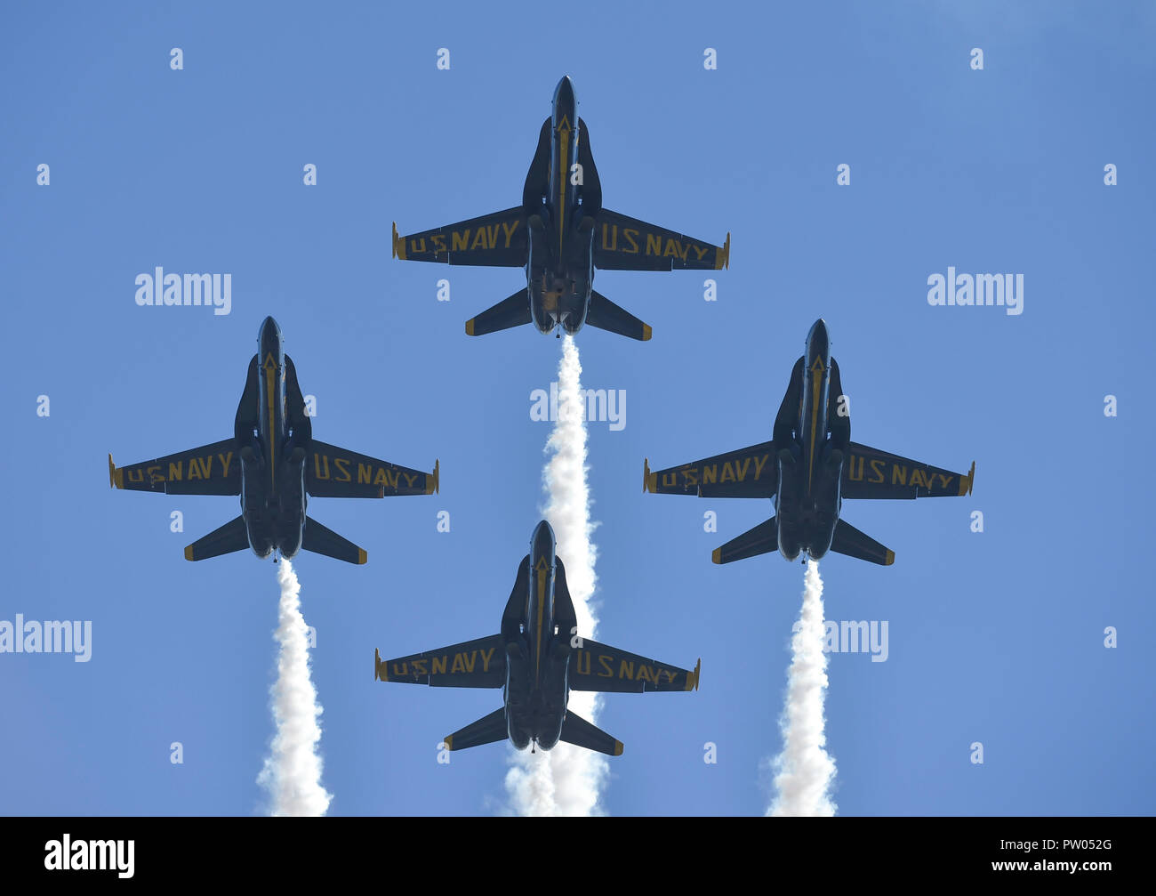 181007-N-ZC358-0372 SAN FRANCISCO (October 7, 2018) The U.S. Navy flight demonstration squadron, the Blue Angels, diamond pilots pass overhead prior to performing the Low Break Cross maneuver during the 2018 San Francisco Fleet Week Air Show. The Blue Angels are scheduled to perform more than 60 demonstrations at more than 30 locations across the U.S. and Canada in 2018. (U.S. Navy photo by Mass Communication Specialist 2nd Class Jess Gray/Released) Stock Photo